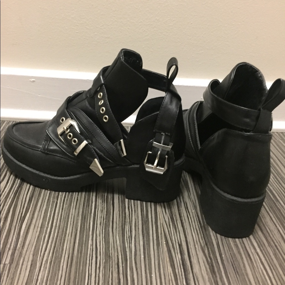 Black buckle ankle cut out combat booties